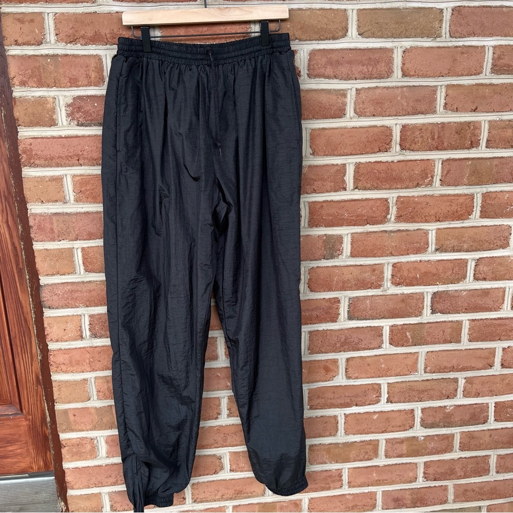 Men’s black nylon joggers with white lining, excellent condt & quality sz: large